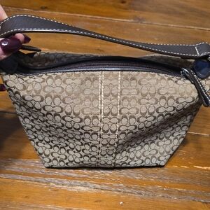 Coach Soho Mini Signature Monogram Logo bag.